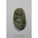 A Chinese hardstone pendant carved as Buddha, 7cm.