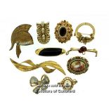 Ten costume brooches