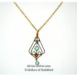 Openwork pendant set with two blue stones, mounted in yellow metal stamped 9ct, on a yellow metal