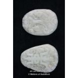 Two Chinese white hardstone pendants.