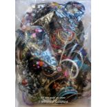 Sealed bag of costume jewellery, gross weight 4.09 kilograms