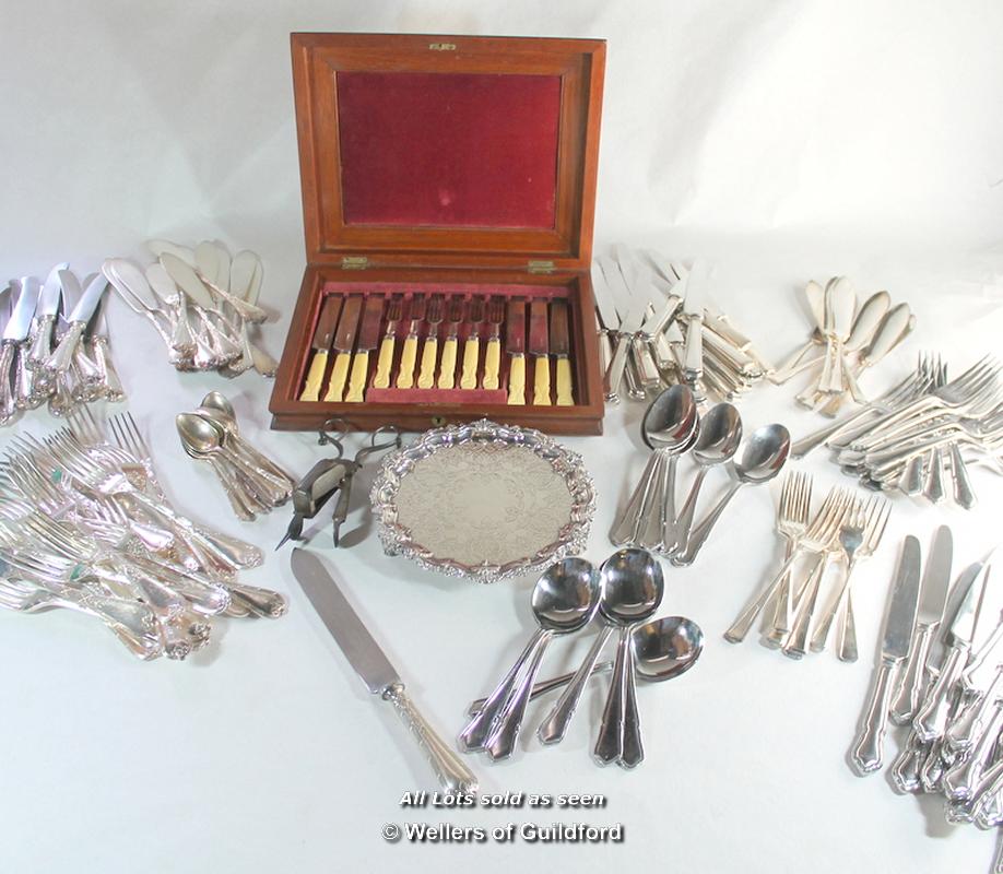 Two part suites of silver plated cutlery, one by Elkington; a pair of plated candle snuffers; a