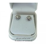 Diamond cluster ear studs, round brilliant cut diamond to the centre with a surround of eight