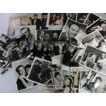 A quantity of black and white film stills including stars such as Marylin Monroe, Norman Wisdom,