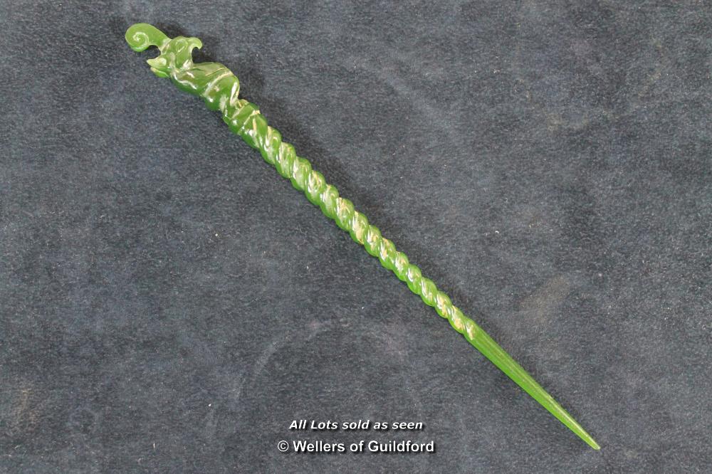 A Chinese green hardstone hairpin, 19cm long.