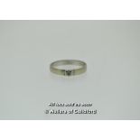 White metal band ring tested as 18ct, set with paste stone, gross weight 3.3 grams