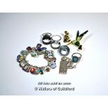 Selection of mostly silver jewellery, including a charm bracelet with country charms, gross weight