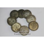 Eight Chinese coins.