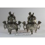 A matched pair of Chinese censors of circular form with dog of Fo finials, 13.5cm.