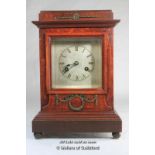 Wooden mantel clock with silvered dial, Junghans two train movement striking on a gong.