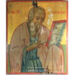 A Greek icon depicting a saint holding a book, 47 x 39cm