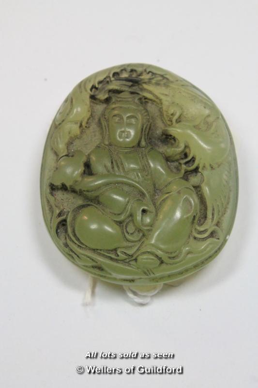 A Chinese hardstone pendant carved as a seated goddess, 5cm.