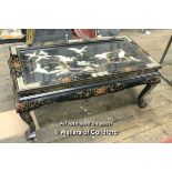 *A Chinese lacquered low table with applied cranes, folding legs, 107 x 56cm.
