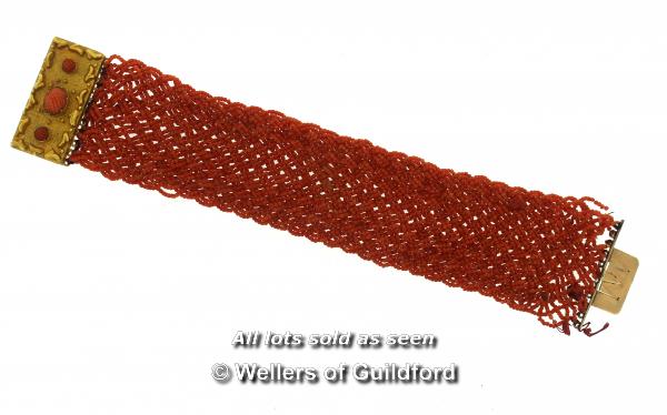 *Woven coral bracelet, with a yellow metal clasp tested 18ct, length 18cm, a/f, has come undone in