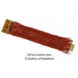 *Woven coral bracelet, with a yellow metal clasp tested 18ct, length 18cm, a/f, has come undone in