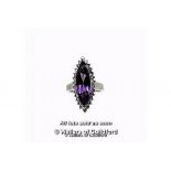 Amethyst and diamond marquise shaped cluster ring, the central marquise cut amethyst surrounded by