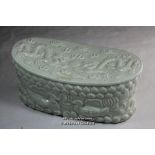 A Chinese celadon green pillow, 25.5cm wide.