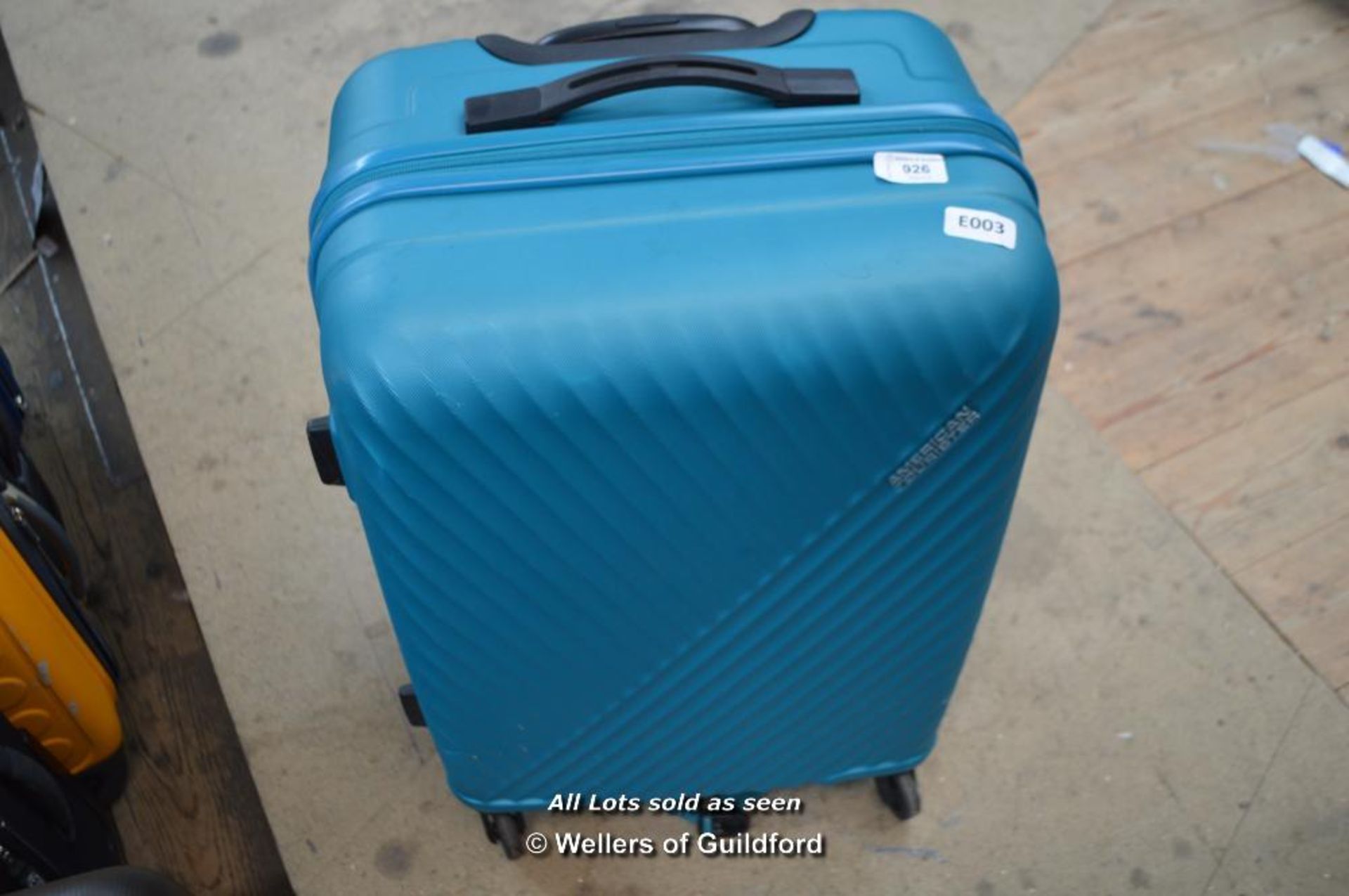 *AMERICAN TOURISTER HARD SHELL SUITCASE