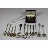 A collection of small silver and white metal spoons including a silver gilt example, a small