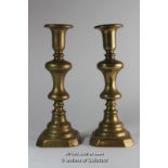 A pair of brass candlesticks, 22.5cm.