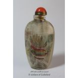 A Chinese interior painted snuff bottle depicting a riverine village.