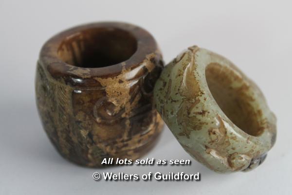 Two Chinese hardstone thumb rings.