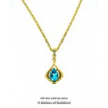 Blue topaz pendant, pear shaped blue pendant mounted in yellow metal stamped 14ct, with a small