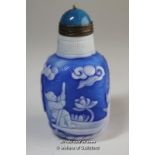 A Chinese blue glass snuff bottle of square form.