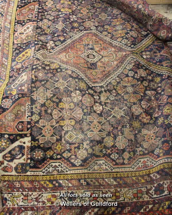Persian woollen rug, 200cm wide.