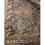 Persian woollen rug, 200cm wide.