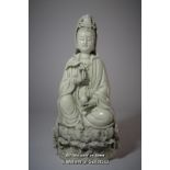 A Chinese blanc de chine figure of a goddess seated on a lotus flower, impressed mark to back,