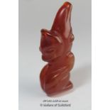 A carved hardstone pendant carved as a mythical figure, 7cm.