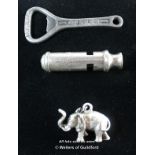 A white metal elephant pendant stamped 925; metal bottle opener; a metal whistle.