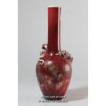 A Chinese sang de boeuf style bottle vase with applied dragon, six character mark, 21.5cm