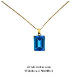 Topaz pendant, large rectangular cut blue topaz mounted in yellow metal tested as 9ct, on a 9ct