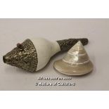 Two decorative shells, one decorated with metal, one carved with a beach scene and signed Noumea (