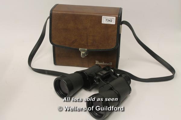 Bushnell 7 x 50 binoculars, in leather case