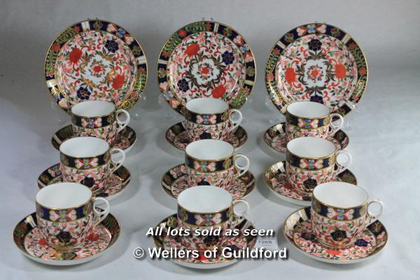 Crown Derby imari pattern, set of nine cups and saucers, three tea plates