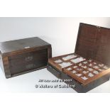 An Edwardian oak collector's box, the lifted lid opening to reveal baize lined glass framed