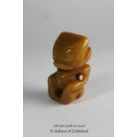 A Chinese yellow hardstone figure of a mythical creature, 5cm.