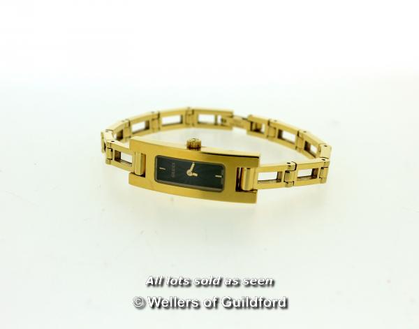 Ladies' Gucci 3900L gold plated stainless steel bracelet watch, with black textured rectangular