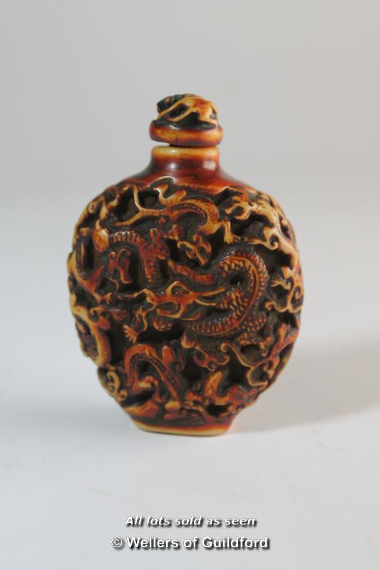 Chinese carved resin snuff bottle.