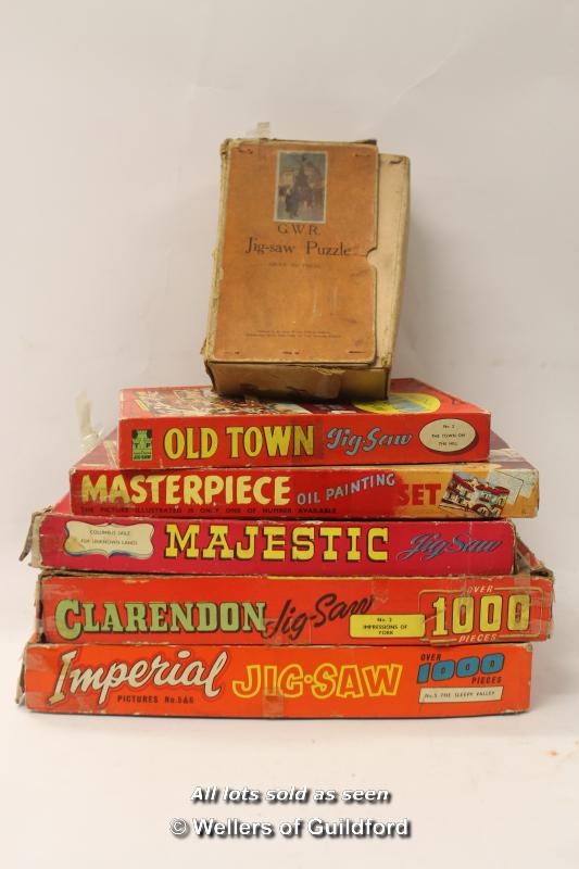 Assorted puzzles including G.W.R. by Chad Valley and a vintage oil painting set (6)