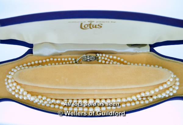 *Vintage three row Lotus pearl necklace with silver marcasite clasp, boxed (Lot subject to VAT)