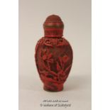 A Chinese cinnabar lacquer style snuff bottle