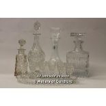 Cut glass wares: heavily cut square form decanter, two further decanters, square section scent