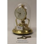 Bentima anniversary clock under glass dome, 18cm overall.