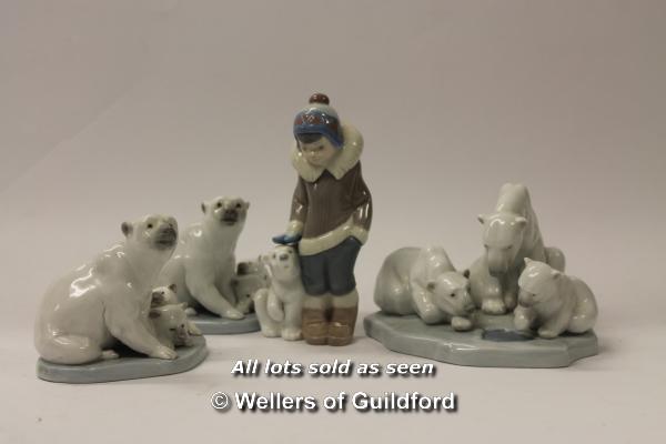 Lladro Inuit child with polar bear cub; three Lladro polar bear figure groups with adult and cubs (