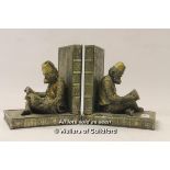 A pair of modern monkey bookends.