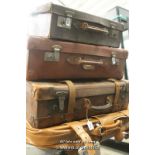 Four vintage leather suitcases including demob